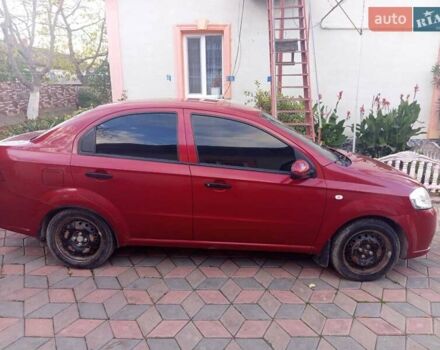 Красный Шевроле Авео, объемом двигателя 1.5 л и пробегом 200 тыс. км за 3400 $, фото 3 на Automoto.ua