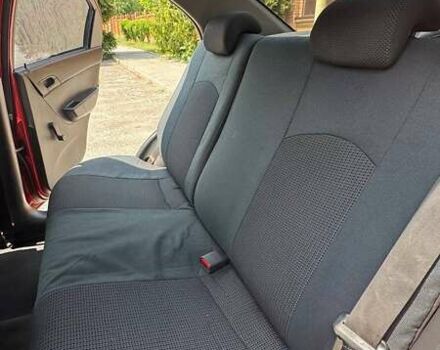 Красный Шевроле Авео, объемом двигателя 1.5 л и пробегом 329 тыс. км за 2900 $, фото 11 на Automoto.ua