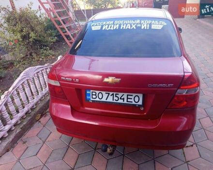 Красный Шевроле Авео, объемом двигателя 1.5 л и пробегом 200 тыс. км за 3400 $, фото 1 на Automoto.ua