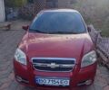 Красный Шевроле Авео, объемом двигателя 1.5 л и пробегом 200 тыс. км за 3400 $, фото 1 на Automoto.ua