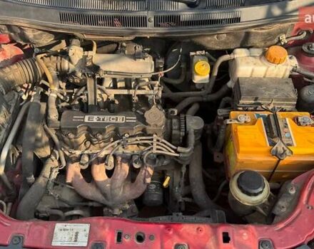 Красный Шевроле Авео, объемом двигателя 1.5 л и пробегом 329 тыс. км за 2900 $, фото 16 на Automoto.ua