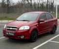 Красный Шевроле Авео, объемом двигателя 1.5 л и пробегом 205 тыс. км за 3700 $, фото 1 на Automoto.ua