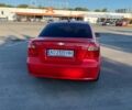 Красный Шевроле Авео, объемом двигателя 1.21 л и пробегом 280 тыс. км за 3999 $, фото 1 на Automoto.ua
