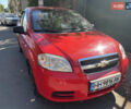 Красный Шевроле Авео, объемом двигателя 1.5 л и пробегом 250 тыс. км за 3400 $, фото 1 на Automoto.ua