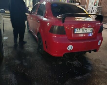 Красный Шевроле Авео, объемом двигателя 1.5 л и пробегом 331 тыс. км за 2700 $, фото 2 на Automoto.ua