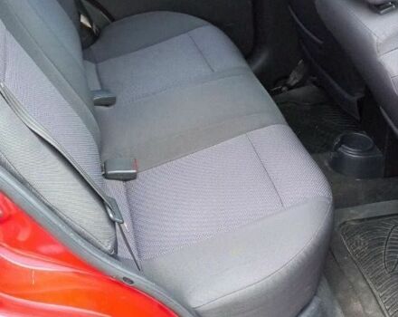 Красный Шевроле Авео, объемом двигателя 1.5 л и пробегом 217 тыс. км за 4500 $, фото 5 на Automoto.ua