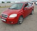 Красный Шевроле Авео, объемом двигателя 1.5 л и пробегом 185 тыс. км за 5000 $, фото 1 на Automoto.ua