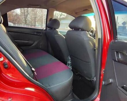 Красный Шевроле Авео, объемом двигателя 1.4 л и пробегом 202 тыс. км за 3600 $, фото 14 на Automoto.ua