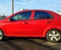 Красный Шевроле Авео, объемом двигателя 1.4 л и пробегом 202 тыс. км за 3600 $, фото 7 на Automoto.ua