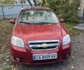 Красный Шевроле Авео, объемом двигателя 1.5 л и пробегом 270 тыс. км за 5500 $, фото 1 на Automoto.ua