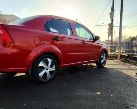 Красный Шевроле Авео, объемом двигателя 1.4 л и пробегом 202 тыс. км за 3600 $, фото 1 на Automoto.ua