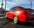Красный Шевроле Авео, объемом двигателя 1.4 л и пробегом 202 тыс. км за 3600 $, фото 3 на Automoto.ua