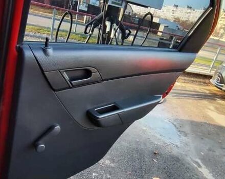 Красный Шевроле Авео, объемом двигателя 1.4 л и пробегом 202 тыс. км за 3600 $, фото 21 на Automoto.ua