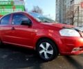 Красный Шевроле Авео, объемом двигателя 1.4 л и пробегом 202 тыс. км за 3600 $, фото 1 на Automoto.ua