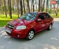 Красный Шевроле Авео, объемом двигателя 1.5 л и пробегом 140 тыс. км за 5000 $, фото 1 на Automoto.ua