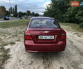 Красный Шевроле Авео, объемом двигателя 1.5 л и пробегом 245 тыс. км за 3400 $, фото 6 на Automoto.ua