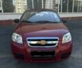Красный Шевроле Авео, объемом двигателя 1.5 л и пробегом 245 тыс. км за 3500 $, фото 1 на Automoto.ua