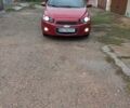 Красный Шевроле Авео, объемом двигателя 1.6 л и пробегом 212 тыс. км за 6300 $, фото 1 на Automoto.ua