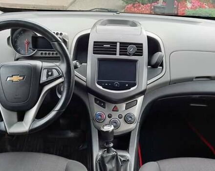 Красный Шевроле Авео, объемом двигателя 1.6 л и пробегом 98 тыс. км за 7200 $, фото 2 на Automoto.ua