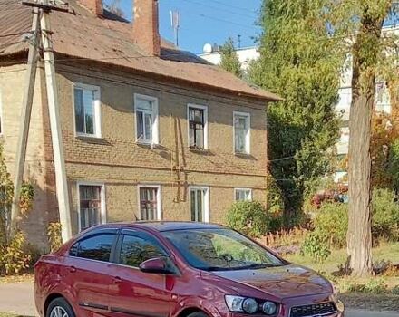 Красный Шевроле Авео, объемом двигателя 1.6 л и пробегом 98 тыс. км за 7200 $, фото 1 на Automoto.ua