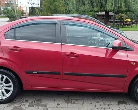 Красный Шевроле Авео, объемом двигателя 1.6 л и пробегом 98 тыс. км за 7200 $, фото 4 на Automoto.ua