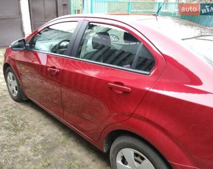 Червоний Шевроле Авео, об'ємом двигуна 1.4 л та пробігом 83 тис. км за 6600 $, фото 4 на Automoto.ua