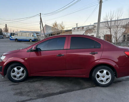 Червоний Шевроле Авео, об'ємом двигуна 1.4 л та пробігом 116 тис. км за 5500 $, фото 6 на Automoto.ua