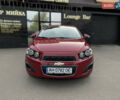 Красный Шевроле Авео, объемом двигателя 1.4 л и пробегом 50 тыс. км за 7000 $, фото 1 на Automoto.ua