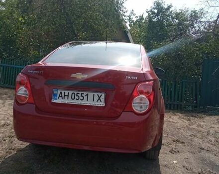 Красный Шевроле Авео, объемом двигателя 1.4 л и пробегом 61 тыс. км за 7300 $, фото 2 на Automoto.ua