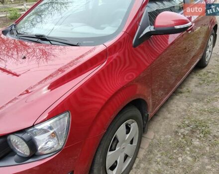 Червоний Шевроле Авео, об'ємом двигуна 1.4 л та пробігом 83 тис. км за 6600 $, фото 1 на Automoto.ua