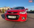 Красный Шевроле Авео, объемом двигателя 1.4 л и пробегом 156 тыс. км за 8500 $, фото 1 на Automoto.ua