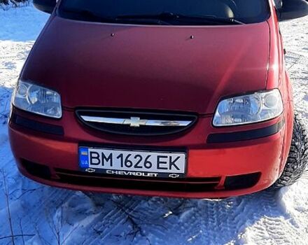 Красный Шевроле Авео, объемом двигателя 1.4 л и пробегом 145 тыс. км за 3800 $, фото 1 на Automoto.ua