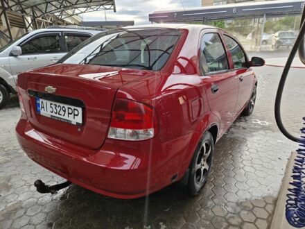 Красный Шевроле Авео, объемом двигателя 1.5 л и пробегом 300 тыс. км за 3000 $, фото 1 на Automoto.ua