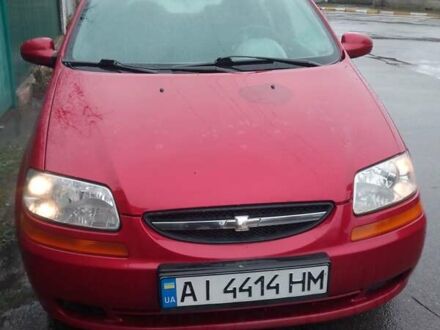 Красный Шевроле Авео, объемом двигателя 1.5 л и пробегом 130 тыс. км за 2400 $, фото 1 на Automoto.ua