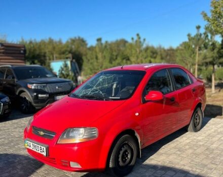 Красный Шевроле Авео, объемом двигателя 1.5 л и пробегом 100 тыс. км за 1950 $, фото 1 на Automoto.ua