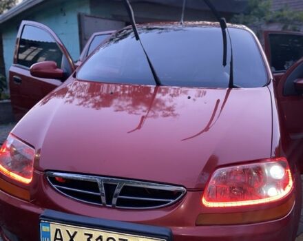 Красный Шевроле Авео, объемом двигателя 1.5 л и пробегом 208 тыс. км за 3400 $, фото 1 на Automoto.ua