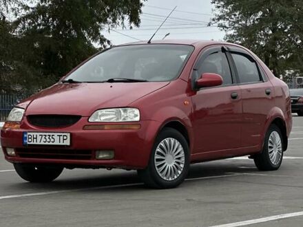 Красный Шевроле Авео, объемом двигателя 1.5 л и пробегом 270 тыс. км за 2599 $, фото 1 на Automoto.ua