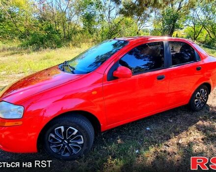 Красный Шевроле Авео, объемом двигателя 1.5 л и пробегом 318 тыс. км за 3000 $, фото 1 на Automoto.ua