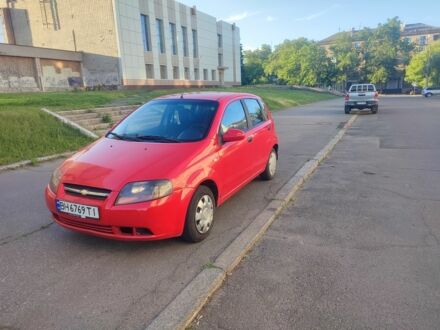 Красный Шевроле Авео, объемом двигателя 1.5 л и пробегом 270 тыс. км за 2800 $, фото 1 на Automoto.ua