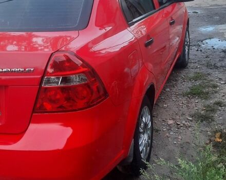 Красный Шевроле Авео, объемом двигателя 1.5 л и пробегом 350 тыс. км за 2900 $, фото 1 на Automoto.ua