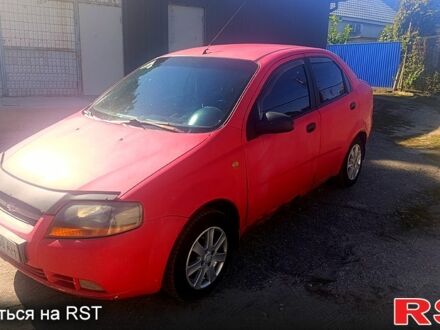 Красный Шевроле Авео, объемом двигателя 1.5 л и пробегом 350 тыс. км за 1200 $, фото 1 на Automoto.ua
