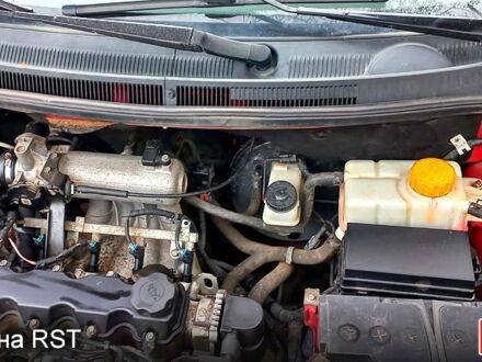 Червоний Шевроле Авео, об'ємом двигуна 1.5 л та пробігом 168 тис. км за 4200 $, фото 1 на Automoto.ua