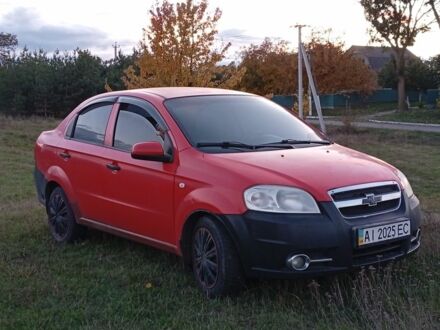 Красный Шевроле Авео, объемом двигателя 1.5 л и пробегом 320 тыс. км за 3000 $, фото 1 на Automoto.ua