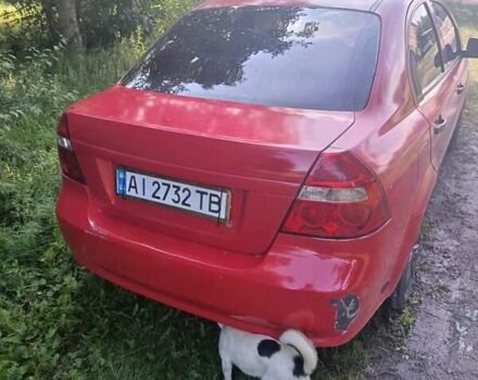 Красный Шевроле Авео, объемом двигателя 1.5 л и пробегом 300 тыс. км за 2700 $, фото 1 на Automoto.ua