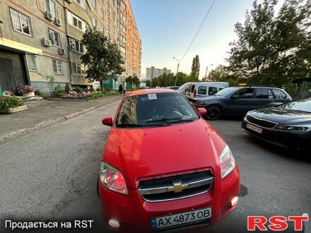 Красный Шевроле Авео, объемом двигателя 1.5 л и пробегом 215 тыс. км за 4000 $, фото 1 на Automoto.ua