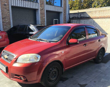 Красный Шевроле Авео, объемом двигателя 1.5 л и пробегом 365 тыс. км за 3100 $, фото 1 на Automoto.ua