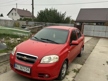 Красный Шевроле Авео, объемом двигателя 1.5 л и пробегом 327 тыс. км за 3200 $, фото 1 на Automoto.ua