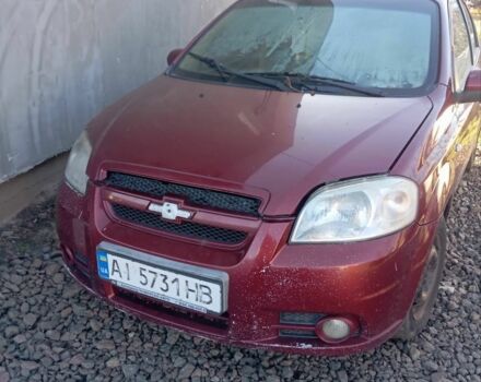 Красный Шевроле Авео, объемом двигателя 1.6 л и пробегом 490 тыс. км за 1600 $, фото 1 на Automoto.ua
