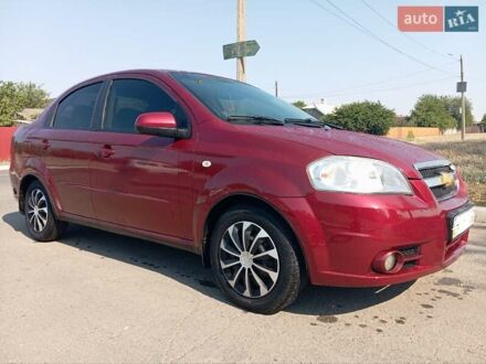 Красный Шевроле Авео, объемом двигателя 1.6 л и пробегом 261 тыс. км за 3600 $, фото 1 на Automoto.ua