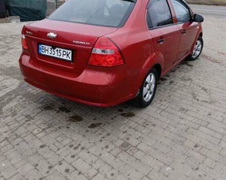 Красный Шевроле Авео, объемом двигателя 1.5 л и пробегом 210 тыс. км за 4000 $, фото 1 на Automoto.ua
